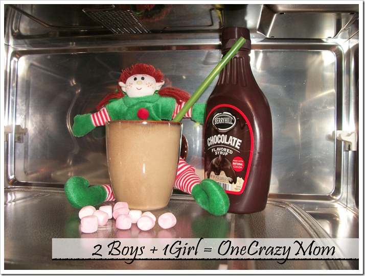 Elf Magic Elf making Hot Cocoa in the microwave